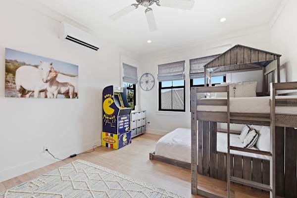 Room with retro gaming and bunk bed