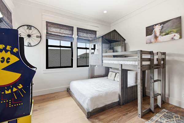 Room with retro gaming and bunk bed