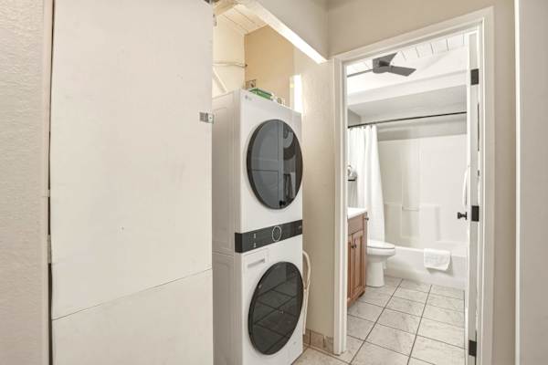 For added convenience during your stay, your unit includes an in-unit stacked washer and dryer, located right outside the full bathroom.