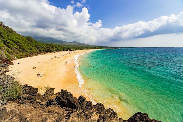 Relax on the wide, golden sands of Makena Beach (Big Beach), one of Maui's largest and most famous beaches.
