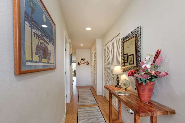 Bright Hallway Leading To Bedrooms