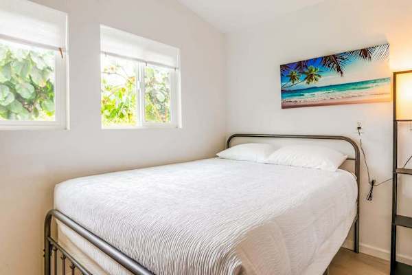 Studio with queen bed and flat screen tv.