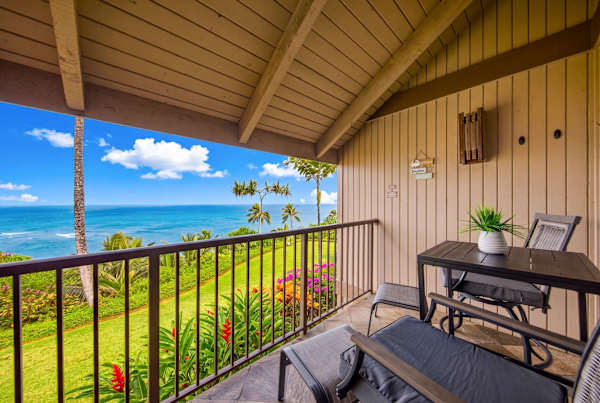 Breezy lanai creates a setting for outdoor meals above gardens