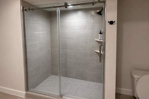 Bathroom includes modern fixtures and a refreshing shower