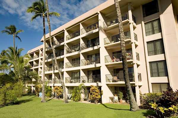 Your ideal Maui retreat at Kihei Akahi, surrounded by lush tropical grounds and private lanai views.