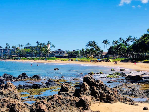 Golden sands, gentle waves, and postcard-worthy views—your perfect day at Kamaole Beach Park awaits.