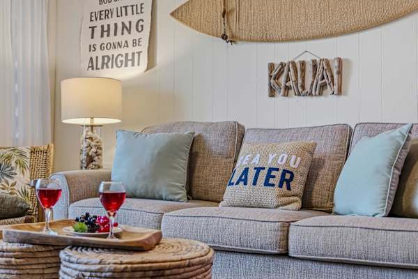 Comfortable sofa with wine tray & coastal decor