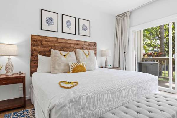 King Bed with Rustic Wood Headboard and Sunburst Pillow