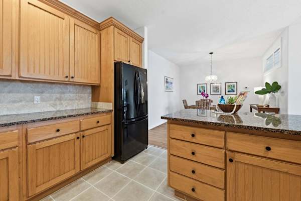 Kitchen with Center Island Open to Dining Area