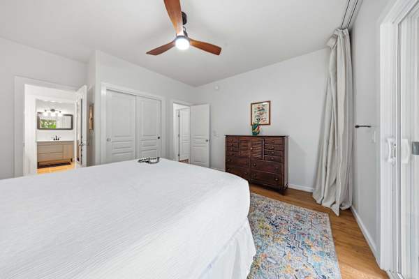 Bedroom with Ensuite Access and Double Closet Doors