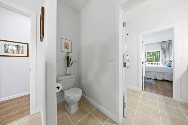 Half Bath with View into Bedroom
