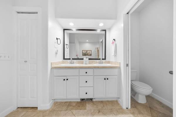 Bathroom with Vanity and Separate Toilet Nook