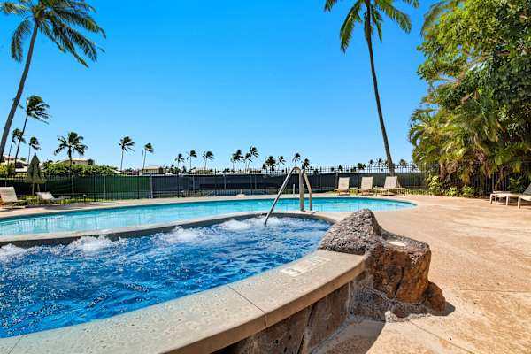 Hot Tub with Water Feature Beside the Community Pool