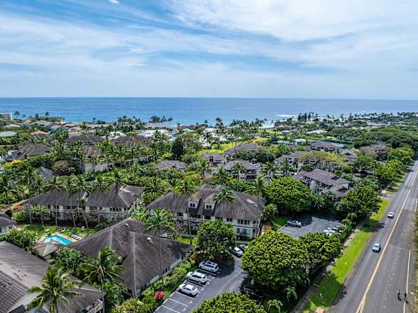 Aerial View of Estate Rooftops with Ocean Views Beyond