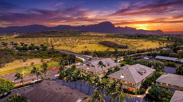 Twilight Sky Over Mountains and Resort Rooftops