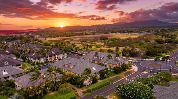 Sunset Over the Mountains and Resort Rooftops
