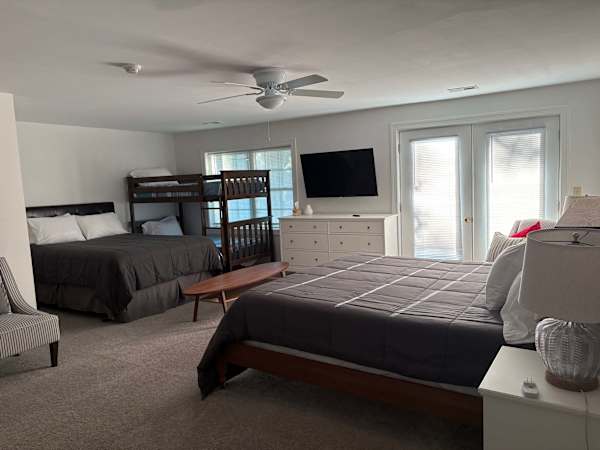 basement master with king bed, queen bed, and 2 sets of bunk beds, and private bathroom