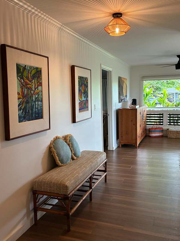 Bench seating located in hallway off front entryway