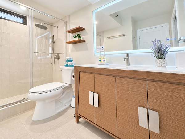 Refresh in your full bathroom with a walk-in shower