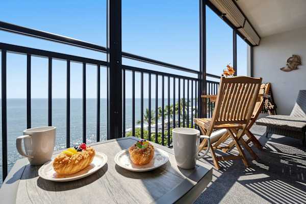 Lanai with ocean views and seating