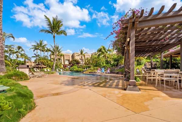 Outdoor dining area near pool