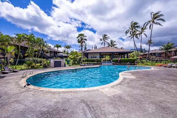 Mauna Kai pool with seating and garden landscape