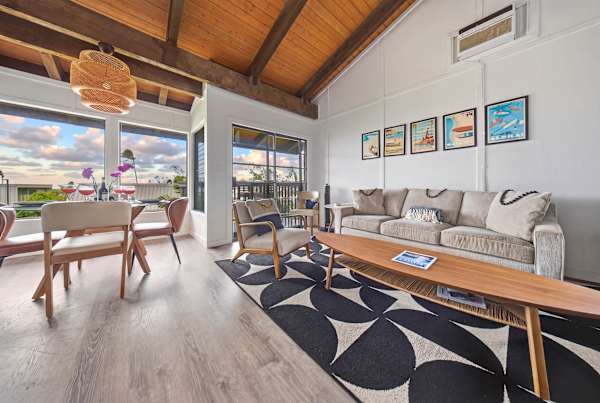 Living room and dining area with lanai access and stunning views