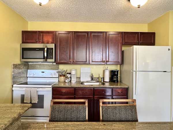 Prepare your meals in your fully equipped kitchen and share meals together in your dining area
