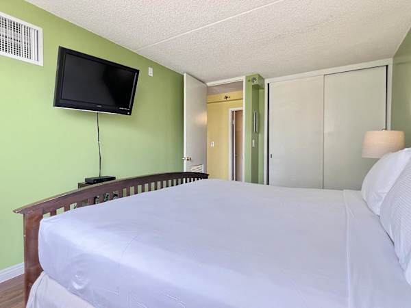 While relaxing, you can watch your favorite TV shows on your 49" TV in the bedroom
