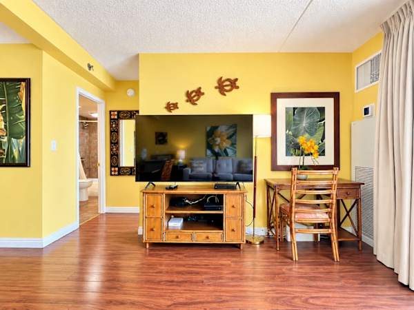 Enjoy watching your favorite shows on your 65" smart TV in the living room