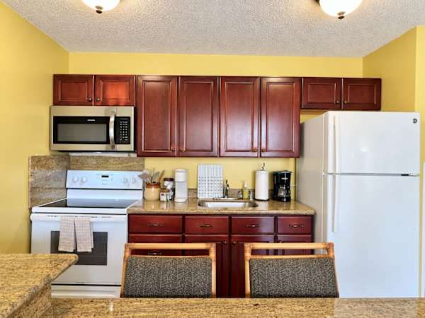 Prepare your meals in your fully equipped kitchen and share meals together in your dining area