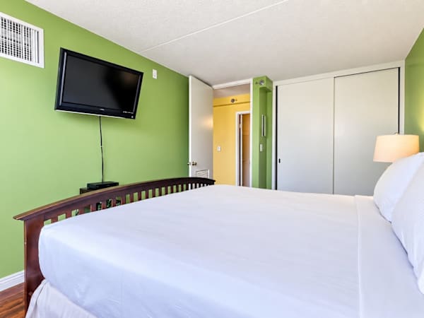 While relaxing, you can watch your favorite TV shows on your 49" TV in the bedroom
