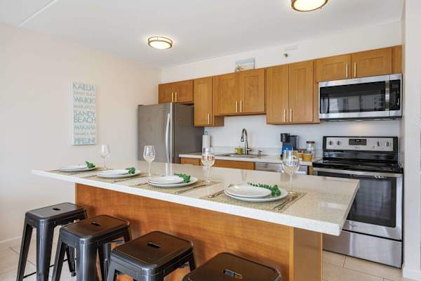 Prepare your dinner in your fully equipped kitchen and share meals together at your kitchen countertop.