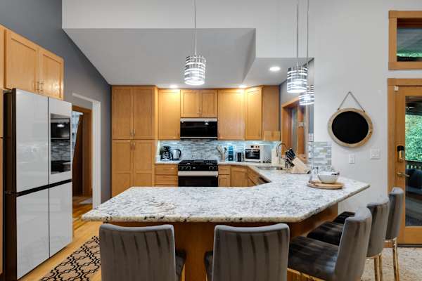 Woodinville Retreat | Decks | BBQ & Fireplace 19 Enjoy plenty of counter space for preparing meals and serving your favorite dishes.