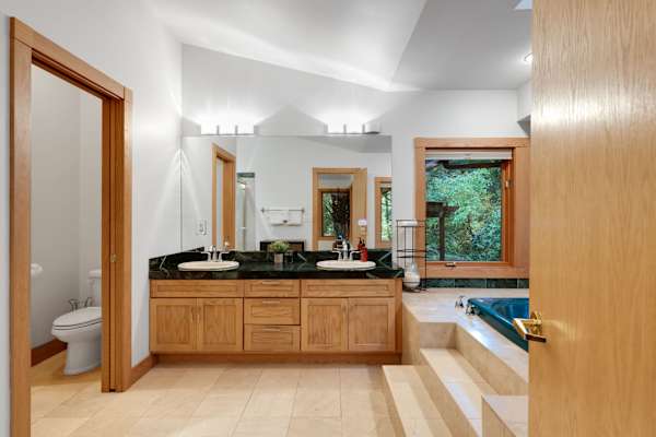 Woodinville Retreat | Decks | BBQ & Fireplace 33 Unwind with a relaxing soak after a day of exploring.