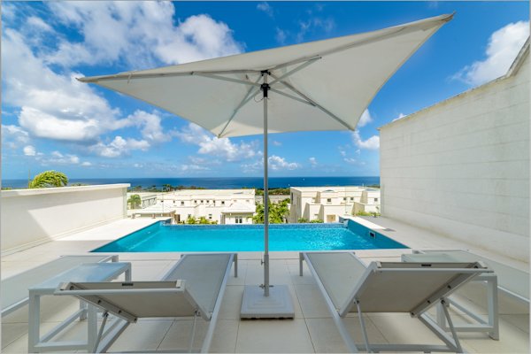 White 4 bedroom villa with amazing ocean views in a gated community in St James