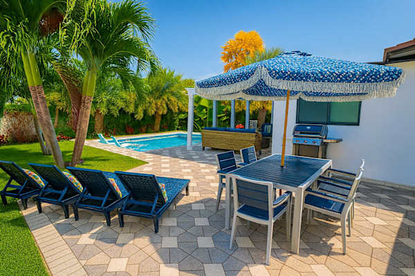 Tropical backyard oasis with private pool at a Chādy-managed Fort Lauderdale vacation rental