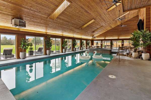 Relaxation redefined: soothe your senses in our large hot tub, letting the gentle jets massage away the day's excitement.