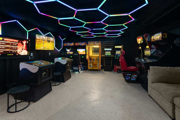 Level up your stay with our vibrant home arcade, where retro games and neon lights spark fun and nostalgia for all ages.