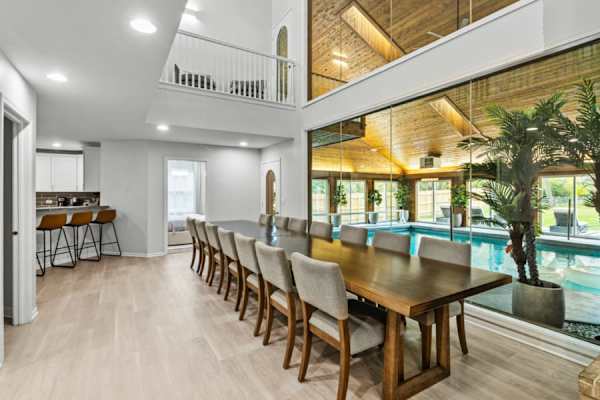 Share meals and moments around our grand dining table, a gathering place for friends and family to connect over delicious dishes.