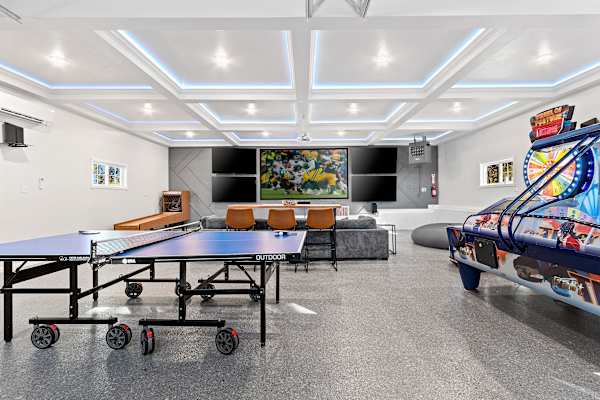 Sophisticated gaming meets historic charm in our versatile living space, perfect for leisure and laughter.