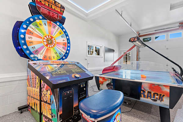 Climb the spiral staircase to a vibrant loft dedicated to retro and modern gaming. This dynamic space is fitted with unlimited, free arcade games, inviting you to step back in time and enjoy the nostalgia of classic arcade fun.
