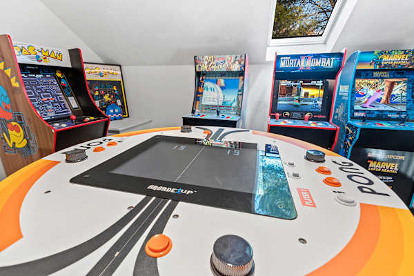 Climb the spiral staircase to a vibrant loft dedicated to retro and modern gaming. This dynamic space is fitted with unlimited, free arcade games, inviting you to step back in time and enjoy the nostalgia of classic arcade fun.