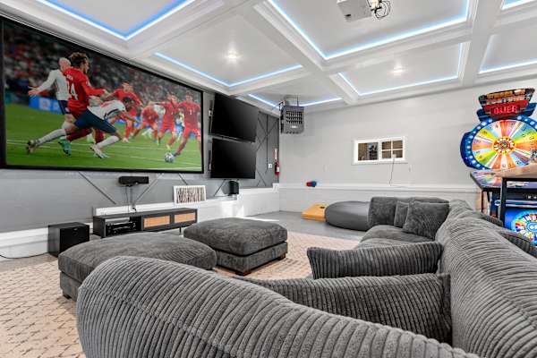 Transform your vacation experience in our 1,100 square foot entertainment garage, a space meticulously crafted for fun, socialization, and relaxation.