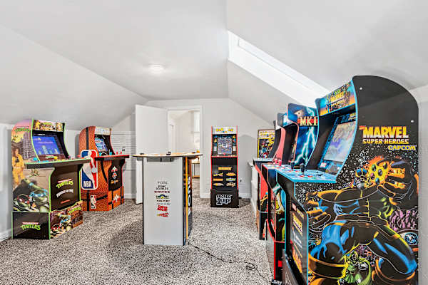 Climb the spiral staircase to a vibrant loft dedicated to retro and modern gaming. This dynamic space is fitted with unlimited, free arcade games, inviting you to step back in time and enjoy the nostalgia of classic arcade fun.