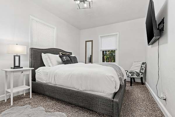 Bedroom six offers a cozy queen bed, conveniently on the first floor.
