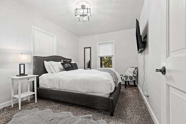 Bedroom six has a comfortable queen bed, conveniently situated on the first floor.