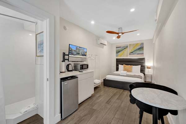 Studio unit with bed, kitchenette, and ensuite