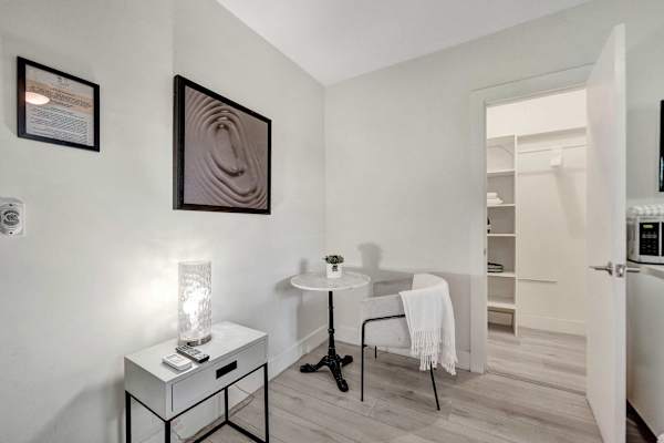 Cozy sitting area with bistro table and closet