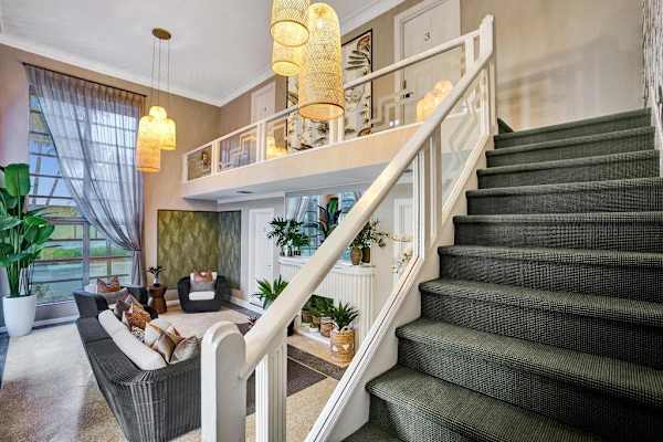 Sweeping staircase overlooking the elegant lobby
